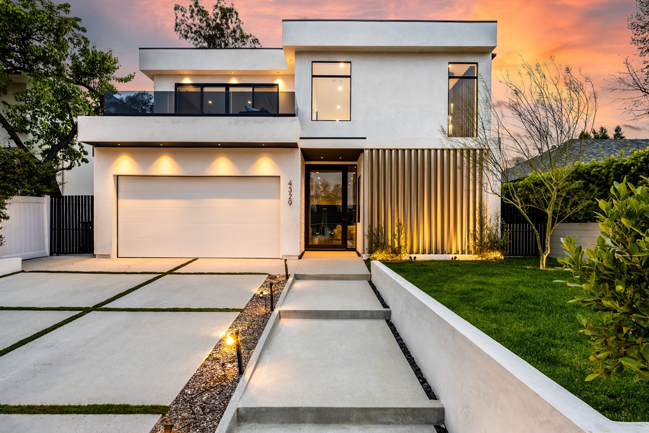 home with paver driveway